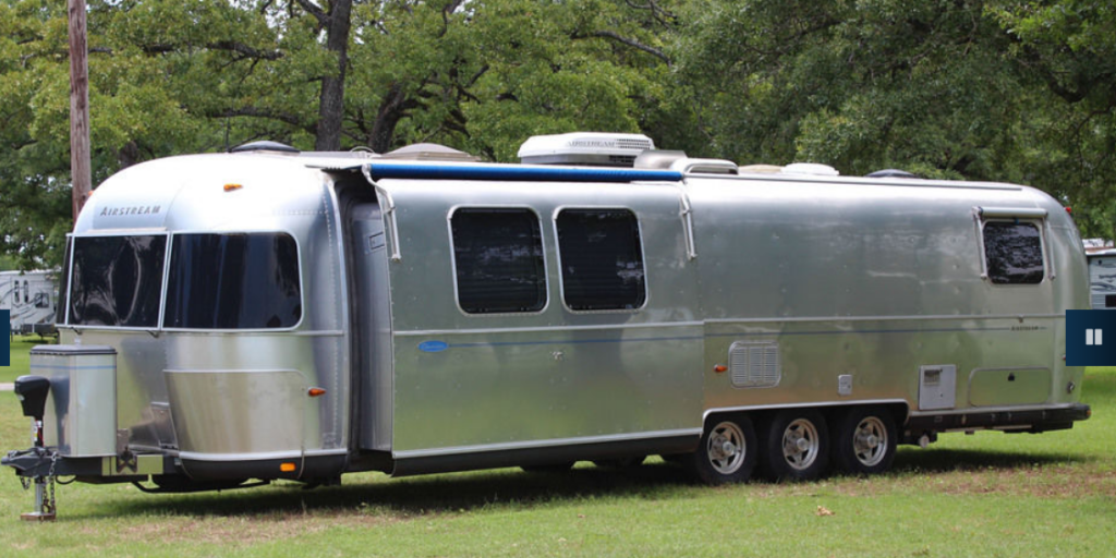 2004 Model 34 Lounge Classic Airstream Travel Trailer that I live in full-time. I'm even writing this blog from my bed inside it!